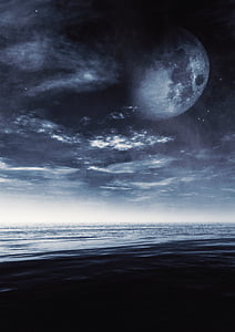 rippling body of water under gibbous moon