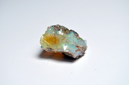 green and brown gemstone fragment