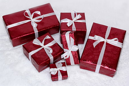 red gift boxes with white laces