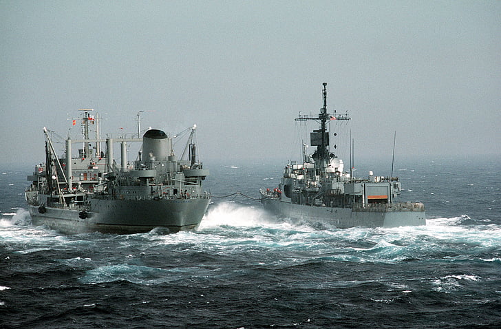 photographed of two gray and white ships