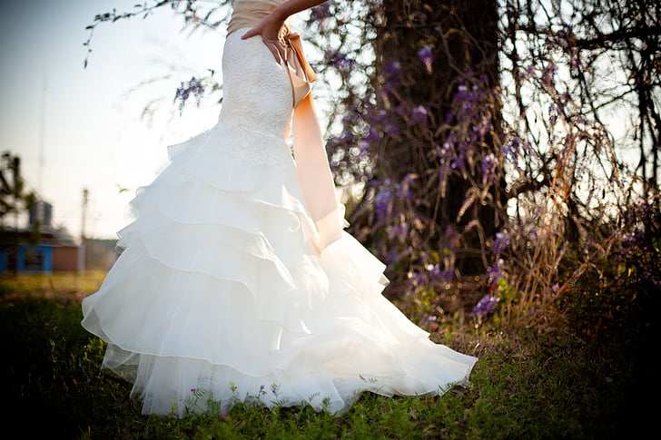 woman wearing white layered dress