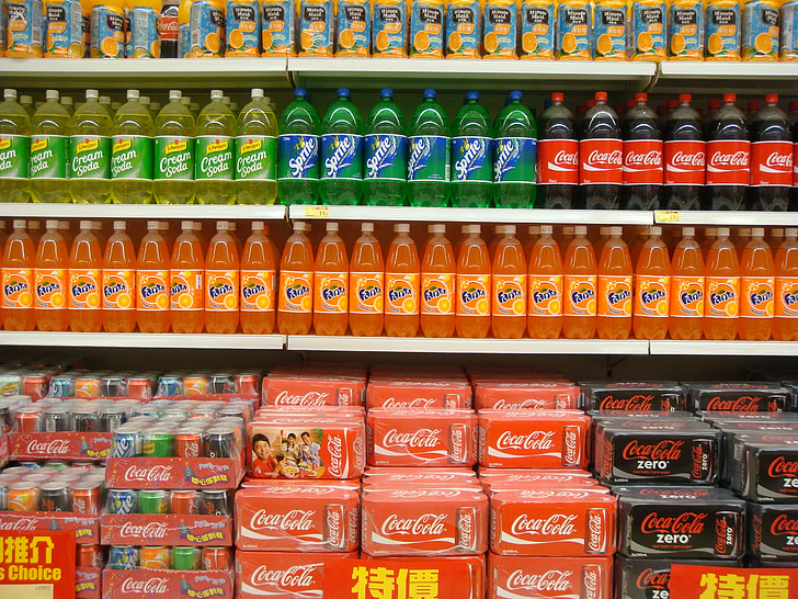 soda bottle and box lot on shelf