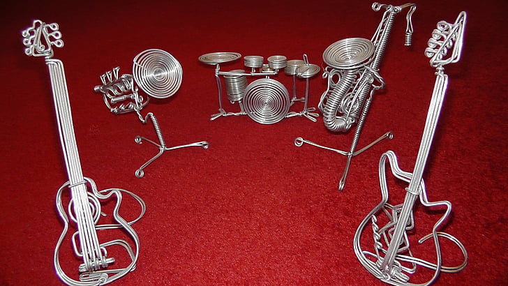grey stainless steel band instrument statuettes