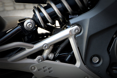 closeup photo of motorcycle coilover