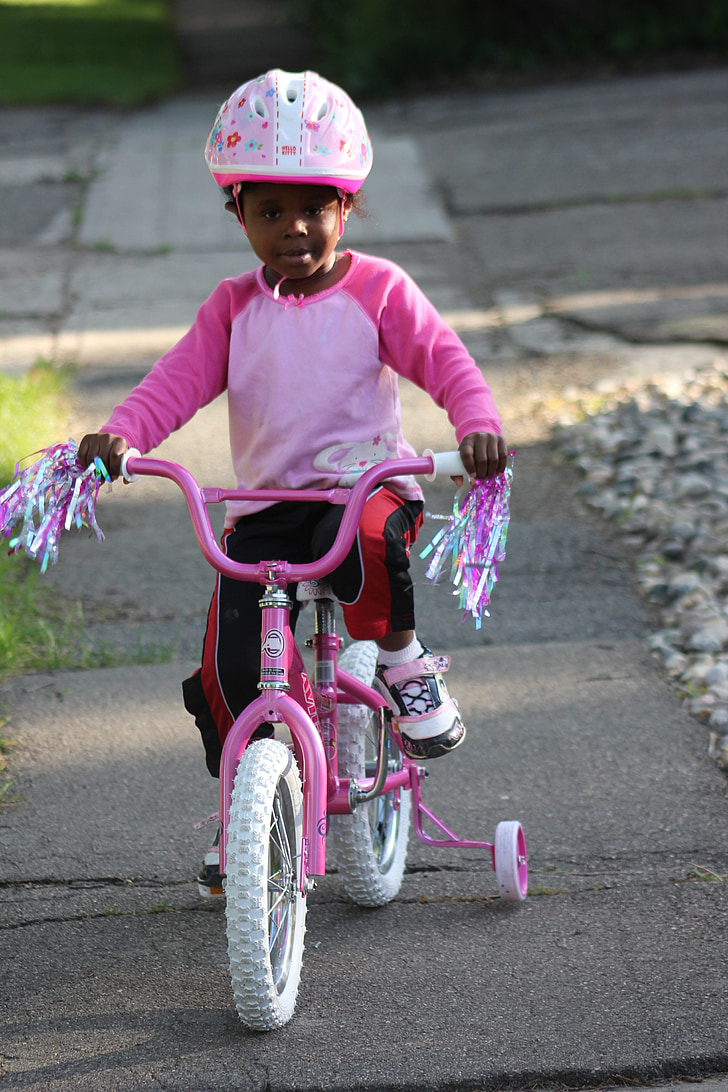 girl riding bicycle