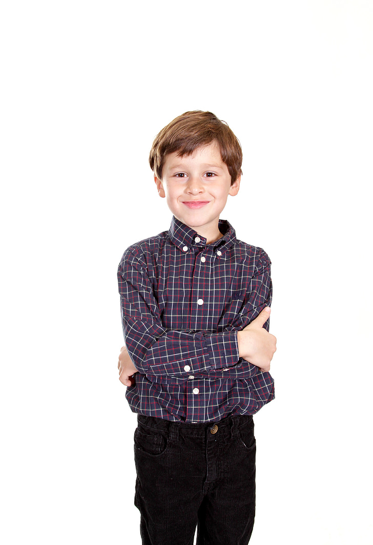 boy wearing black, white, and red flannel shirt