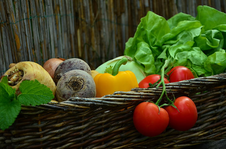 assorted-color vegetable lot on brown wicker basket