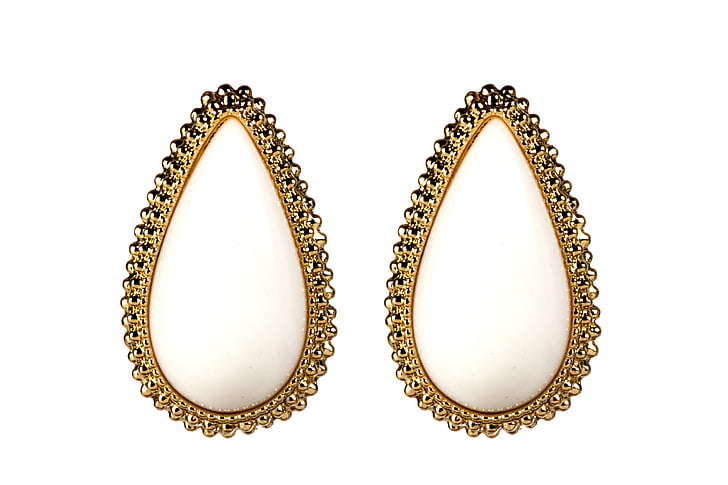 pair of gold-colored earrings