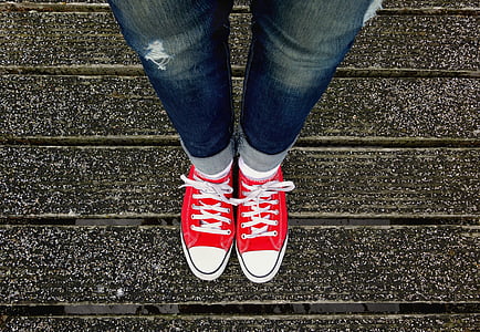 red-and-white low-top lace-up sneakers