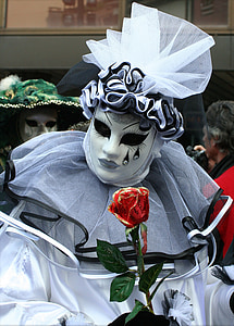 person wearing white and black face mask