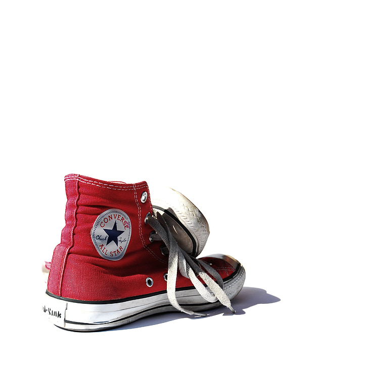 pair of red-and-white Converse All-Star high-tops sneakers