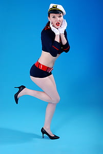woman wearing blue and red sailor costume