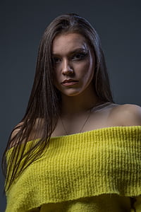 woman wearing yellow off-shoulder top