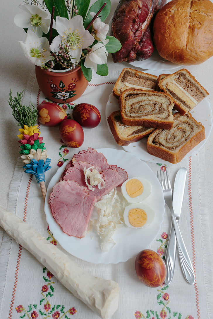 ham and hard-boiled egg on plate