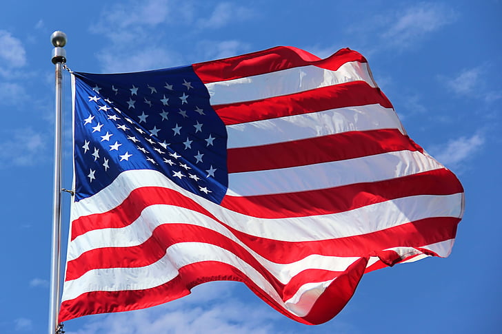 flag of USA hanging on pole