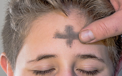 performing the ash wednesday ceremony