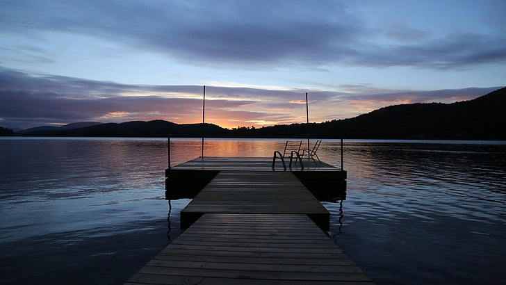 wooden dock during dawn