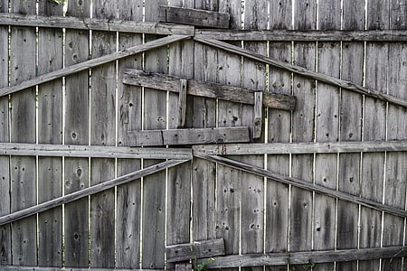 closed gray wooden gate