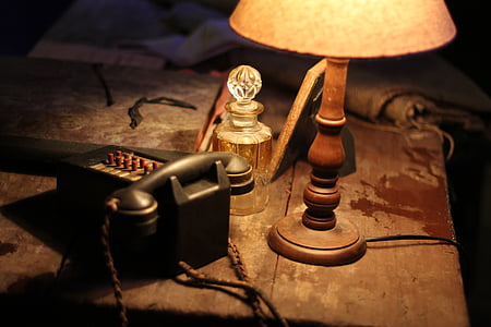telephone near on table lamp