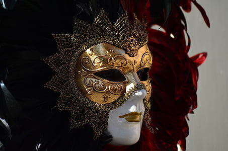 mannequin wearing gold and brown masquerade