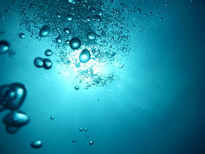 underwater photo of bubbles