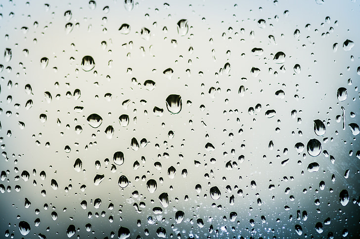 water droplets on clear glass panel wallpaper