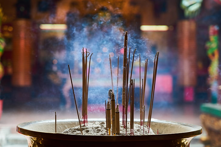 shallow focus of incense sticks