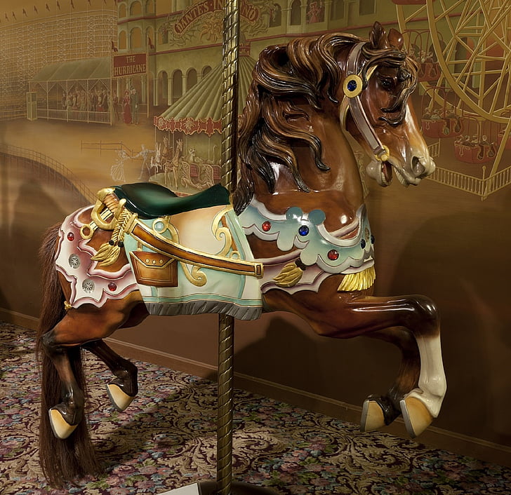 brown and teal horse carousel