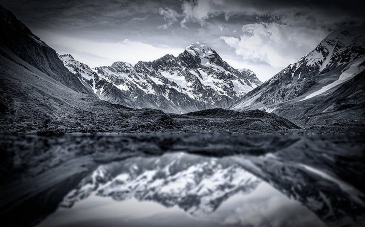 gray scale photography of mountains