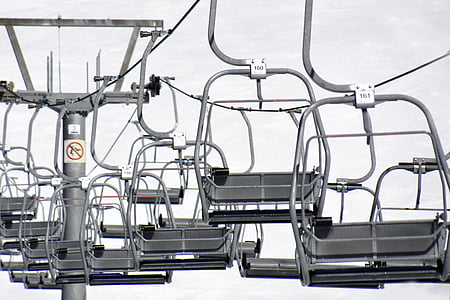 black snow cable cars