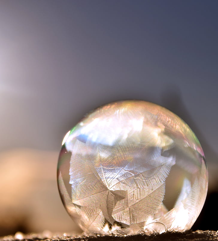 clear glass ball in shallow focus lens