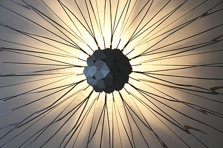 closeup photography of black sunburst metal decor