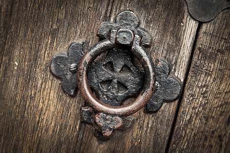 black and brown steel door knocker