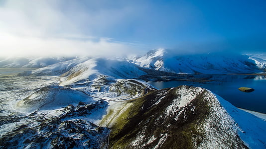 bird's eye view photography of mountains with snow