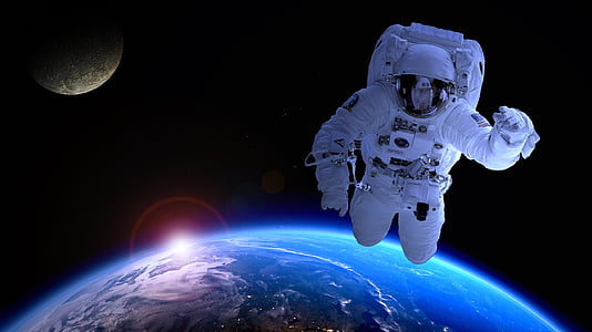 astronaut floating above earth