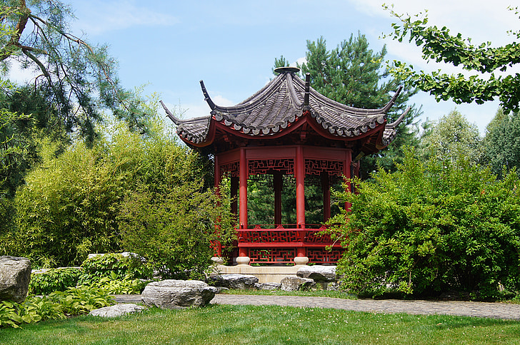 architectural photography of red gazebo