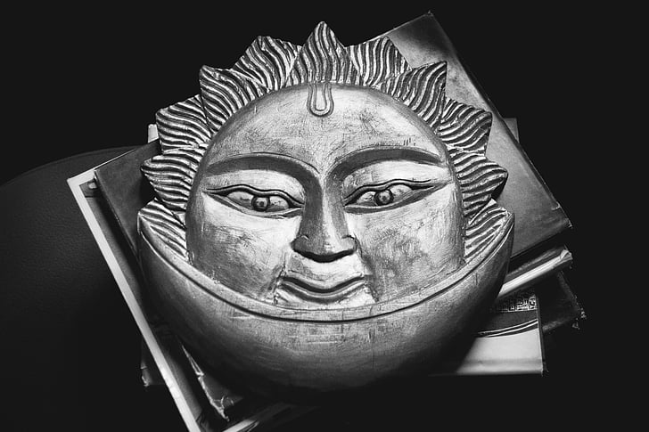 celestial sun carved artwork