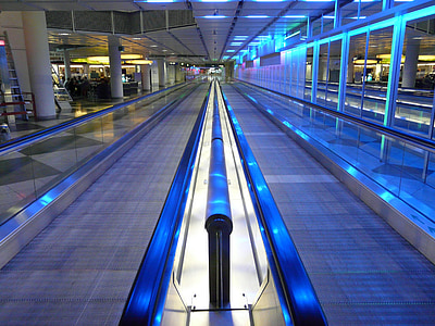 gray travelator with blue LED lights