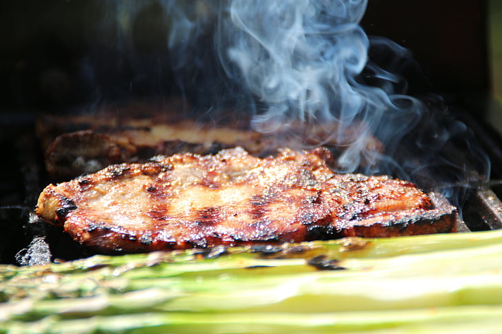 grilled meat with smoke
