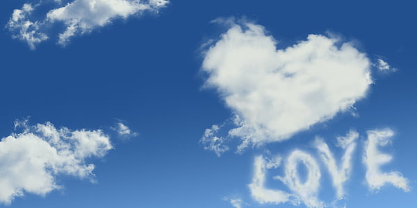 white clouds forming heart and love photo
