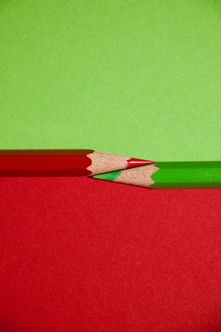 two red and green colored pencils