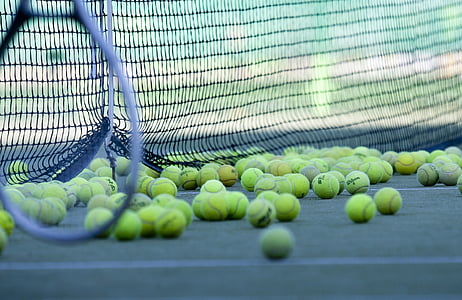 tennis balls under net