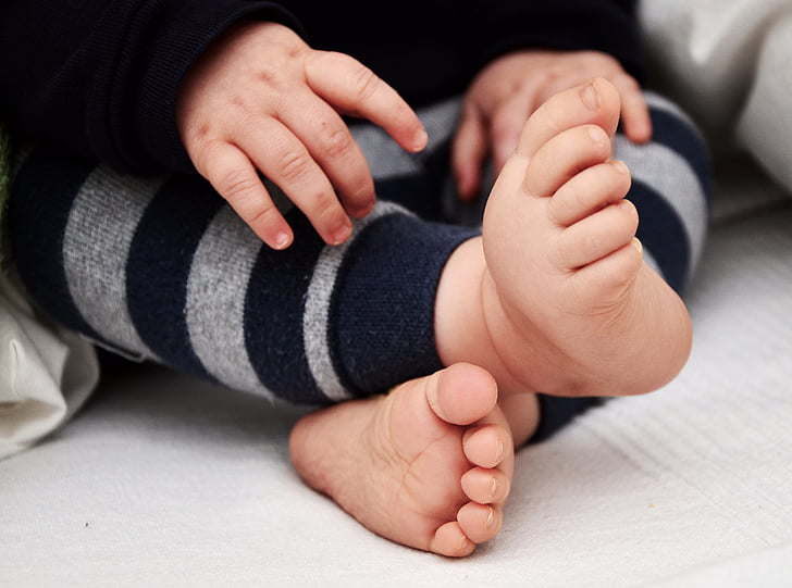 photo of baby's feet and hands