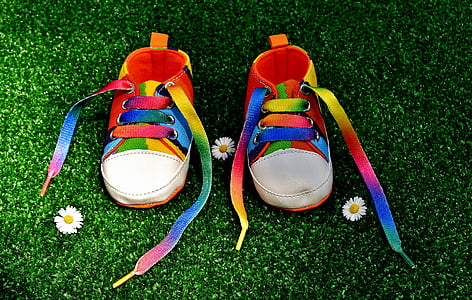 pair of rainbow-colored sneakers