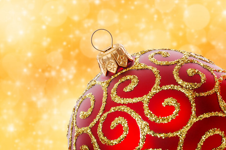 red and gold-colored Christmas Bauble