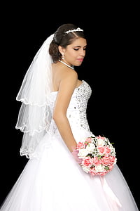 woman in white strapless bridal gown holding pink and white flowers bouquet