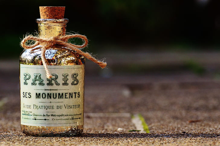 Paris Ses Monuments text printed glass bottle with cork stopper