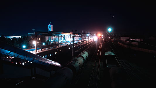 aerial photography of train rails at night time