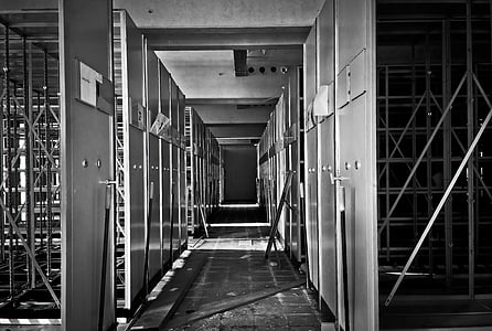 grayscale photo of construction walls