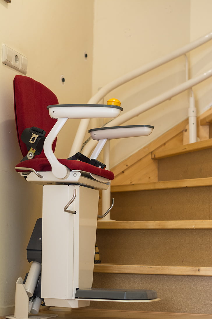 white and red stair lift chair